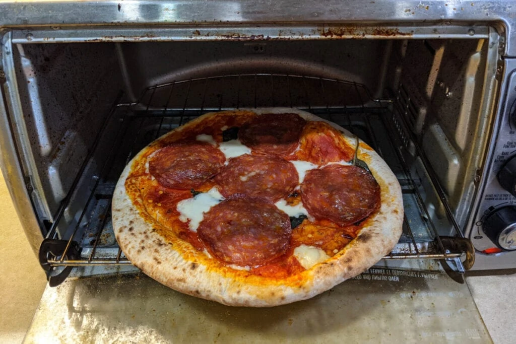 Pizza cooked in a mini oven